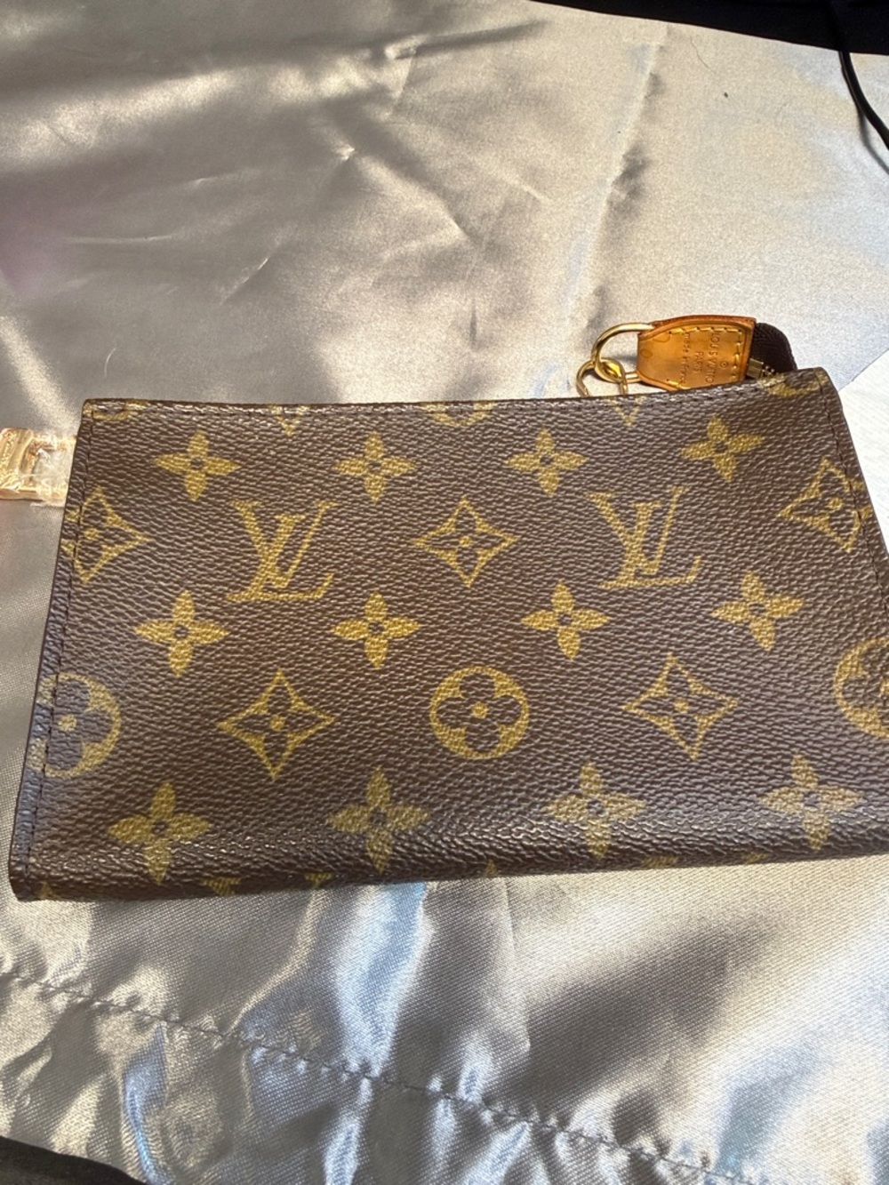 Louis Vuitton Monogram Canvas Wristlet in Brown and Gold
